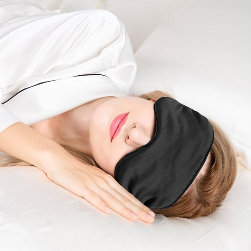 Men's and Women's Sleep Mask blocking out light for deep, uninterrupted sleep, perfect for home or travel.