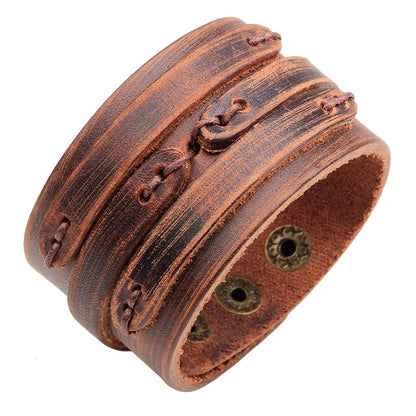 Men’s leather bracelet with steel snap clasps: punk-inspired, available in vibrant colors for a bold, nostalgic look.