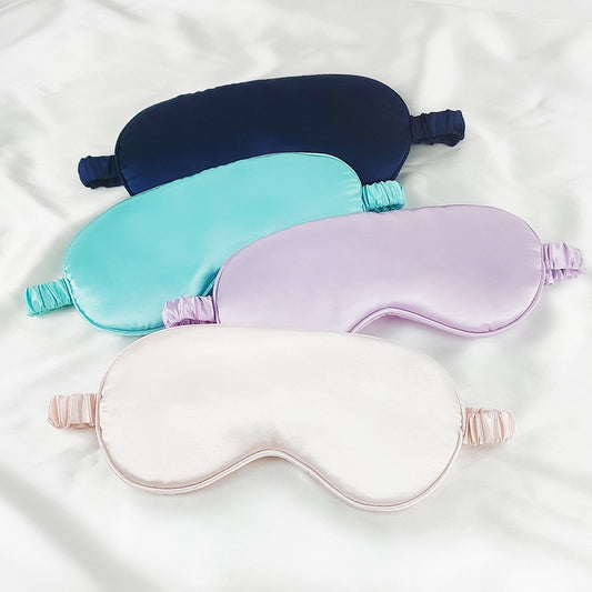 Men's and Women's Sleep Mask blocking out light for deep, uninterrupted sleep, perfect for home or travel.