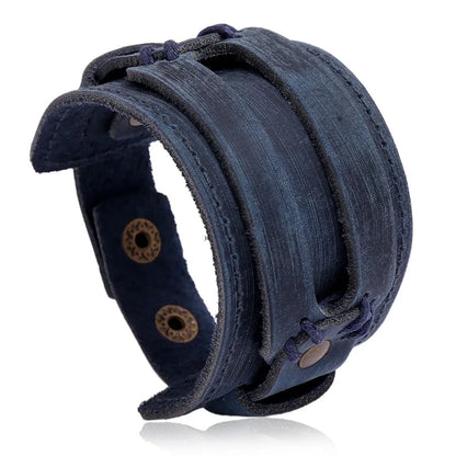 Men’s leather bracelet with steel snap clasps: punk-inspired, available in vibrant colors for a bold, nostalgic look.