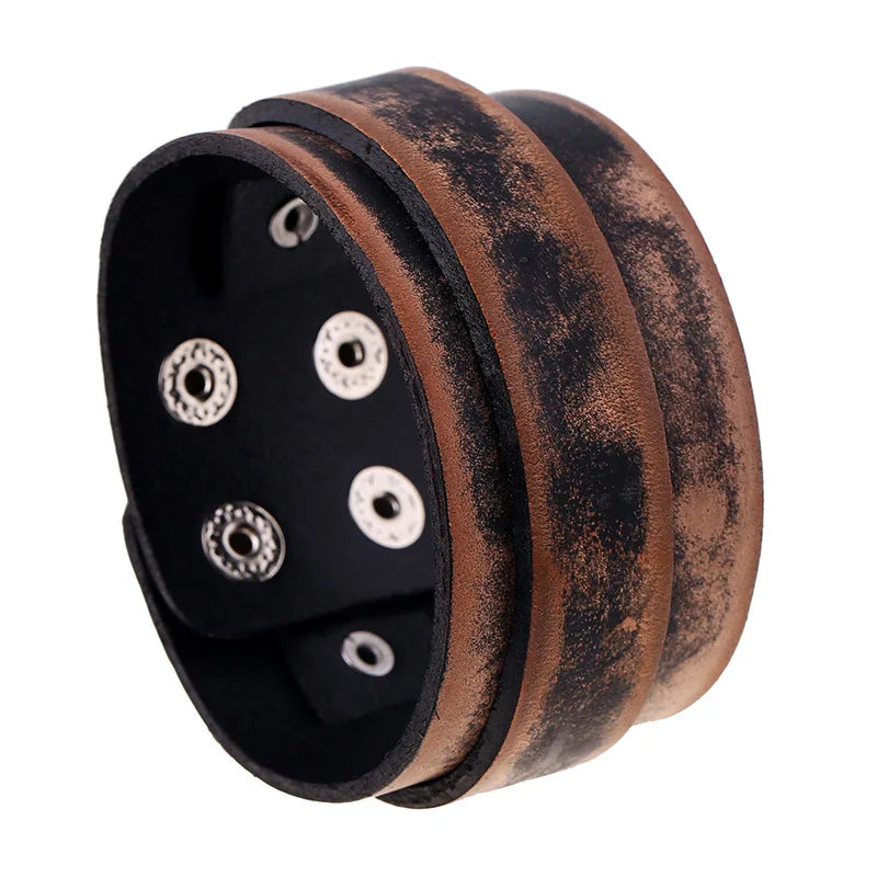 Men’s leather bracelet with steel snap clasps: punk-inspired, available in vibrant colors for a bold, nostalgic look.