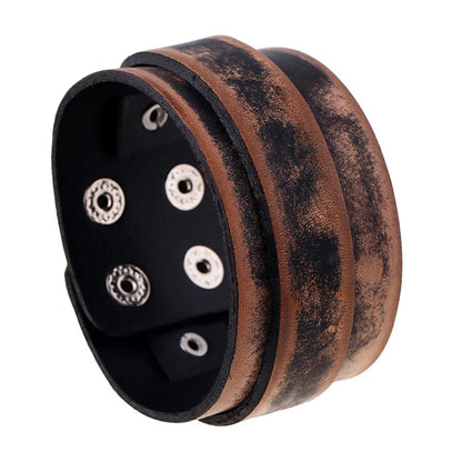 Men’s leather bracelet with steel snap clasps: punk-inspired, available in vibrant colors for a bold, nostalgic look.