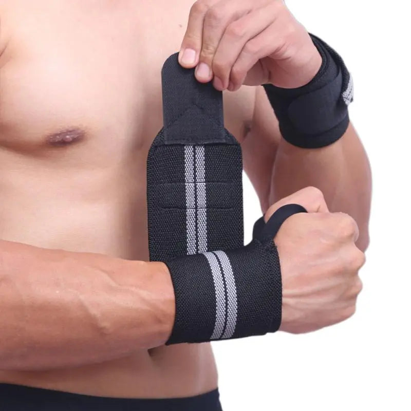 Soft, adjustable wrist supports with a thumb loop, adhesive Velcro for a secure fit, and excellent protection for weight-lifting and training.