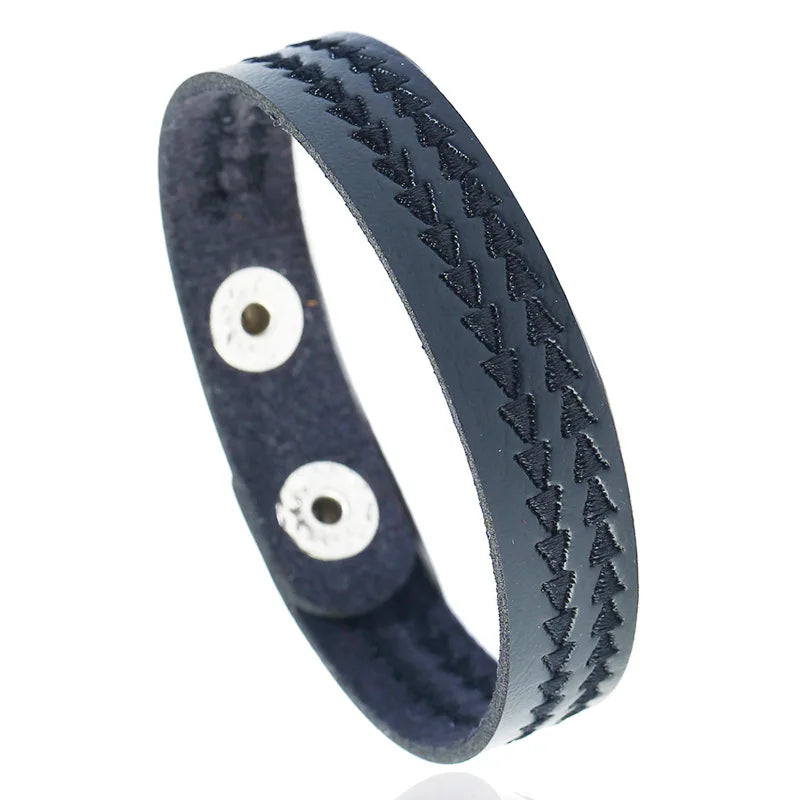 Men’s leather bracelet with steel snap clasps: punk-inspired, available in vibrant colors for a bold, nostalgic look.