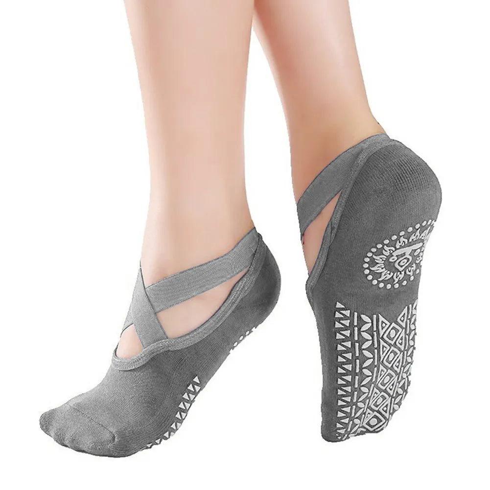 Anti-slip yoga socks made from soft, sweat-absorbent cotton with a high-elasticity design for a snug, comfortable fit.