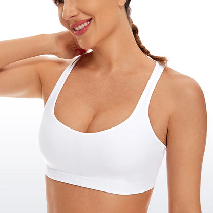 Low cut, wire-free sports bra with a strappy design and Naked Feeling fabric for a soft, lightweight, and comfortable fit. Ideal for low-impact activities