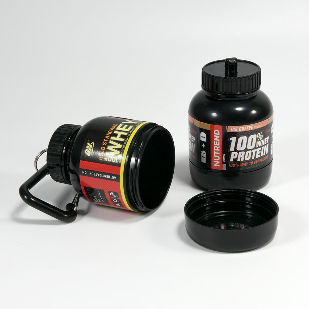 Portable Protein Powder Bottle with keychain attachment, built-in funnel, and medicine box, designed for storing and mixing protein powder and supplements, ideal for camping and outdoor activities. 