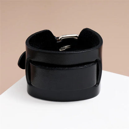 Men’s leather bracelet with steel snap clasps: punk-inspired, available in vibrant colors for a bold, nostalgic look.