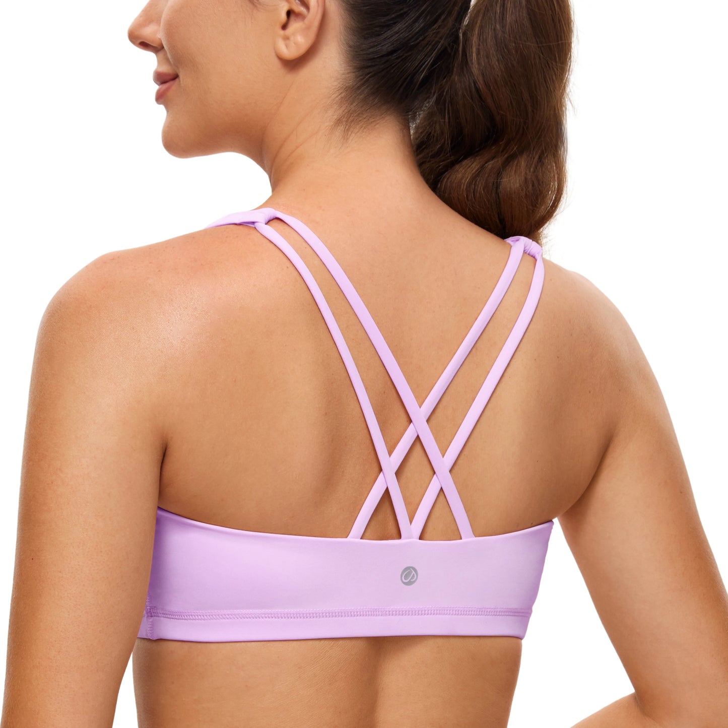 Low cut, wire-free sports bra with a strappy design and Naked Feeling fabric for a soft, lightweight, and comfortable fit. Ideal for low-impact activities