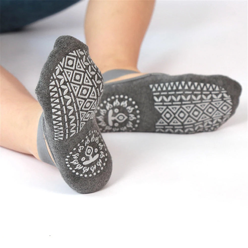 Anti-slip yoga socks made from soft, sweat-absorbent cotton with a high-elasticity design for a snug, comfortable fit.