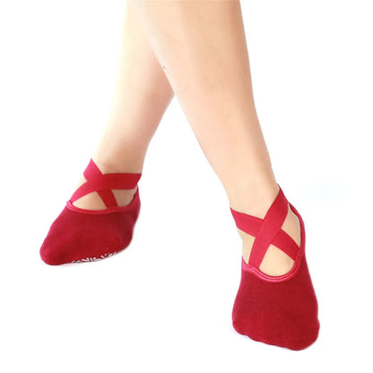 Anti-slip yoga socks made from soft, sweat-absorbent cotton with a high-elasticity design for a snug, comfortable fit.