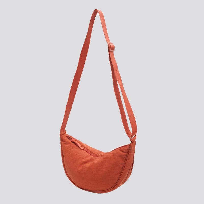 Elevate your style with the Simple Design Women's Messenger Bag, featuring classic and vintage charm. Perfect for all ages, this durable nylon bag combines practicality and fashion.