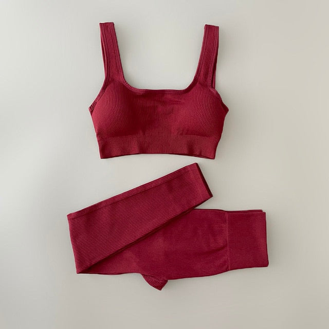 Two-piece Yoga Clothing Set with high-waisted, seamless leggings and a versatile, airy top for comfort and style during any workout.