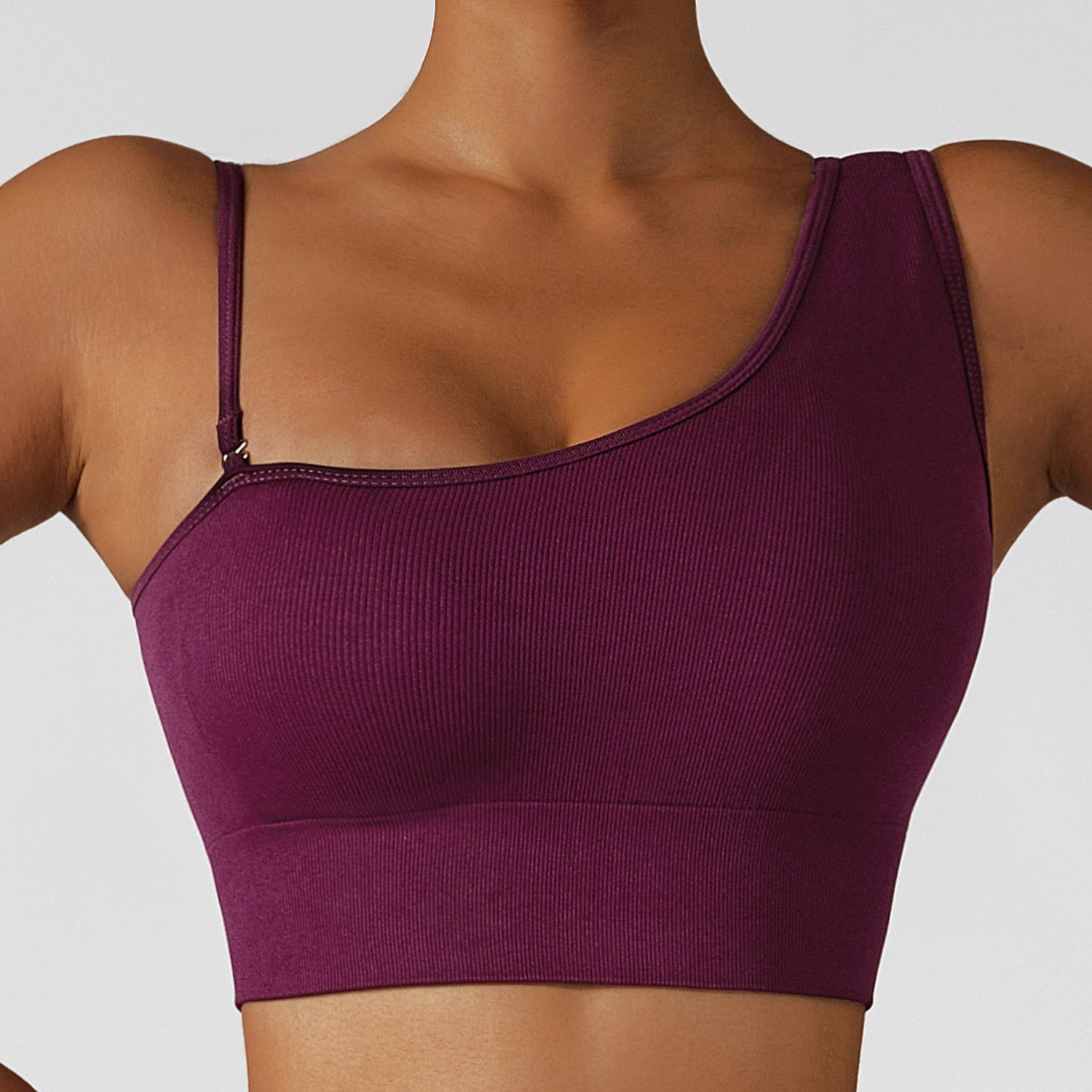  Summer Sexy Oblique Shoulder Yoga Top with asymmetrical design, irregular straps, and push-up feature for style and support. Lightweight and breathable fabric.