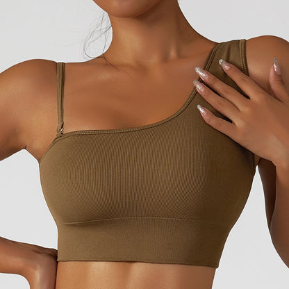  Summer Sexy Oblique Shoulder Yoga Top with asymmetrical design, irregular straps, and push-up feature for style and support. Lightweight and breathable fabric.