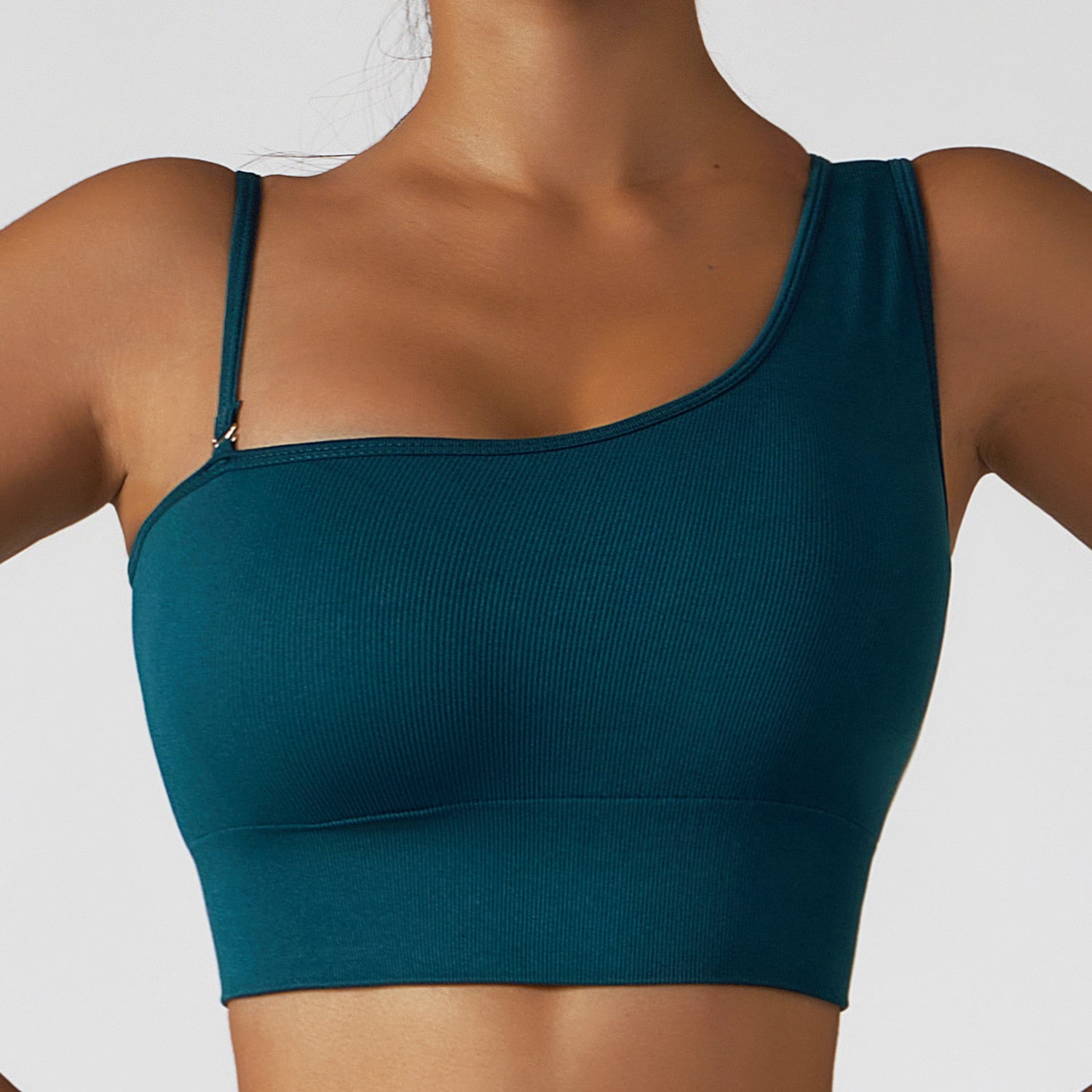  Summer Sexy Oblique Shoulder Yoga Top with asymmetrical design, irregular straps, and push-up feature for style and support. Lightweight and breathable fabric.