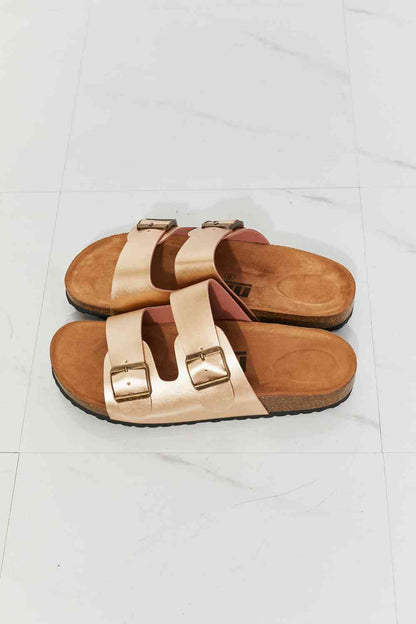 Double-banded slide sandals give a luxe look with their faux leather upper and cork sole. Their comfy design is perfect for wearing for almost any summer adventure. 