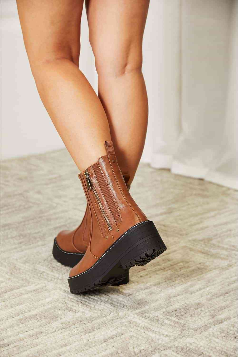 Side zip platform boots: stylish, practical, convenient, and durable for any outfit and terrain.