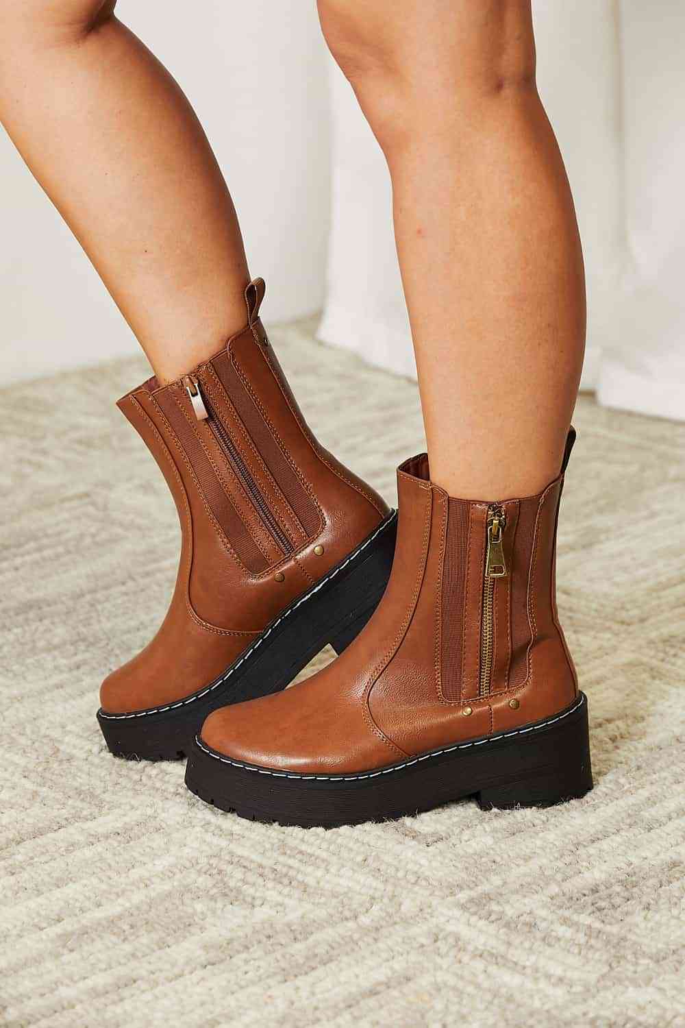 Side zip platform boots: stylish, practical, convenient, and durable for any outfit and terrain.