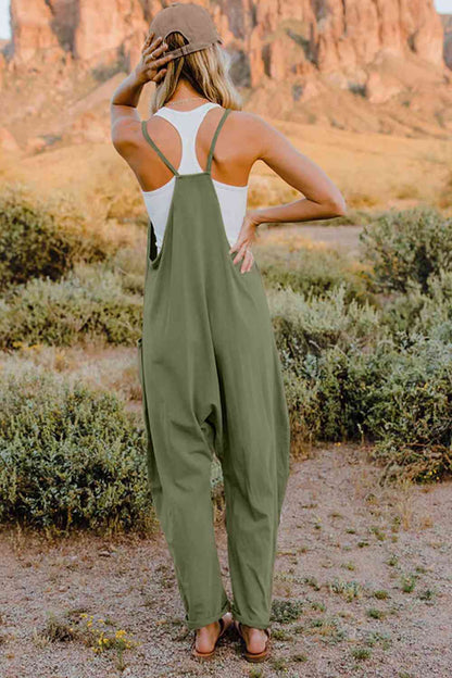 Double Take V-Neck Sleeveless Jumpsuit with Pocket – a blend of effortless elegance and modern chic. Made from luxurious, breathable fabric, it features a flattering V-neckline and a tailored silhouette that beautifully accentuates your figure.