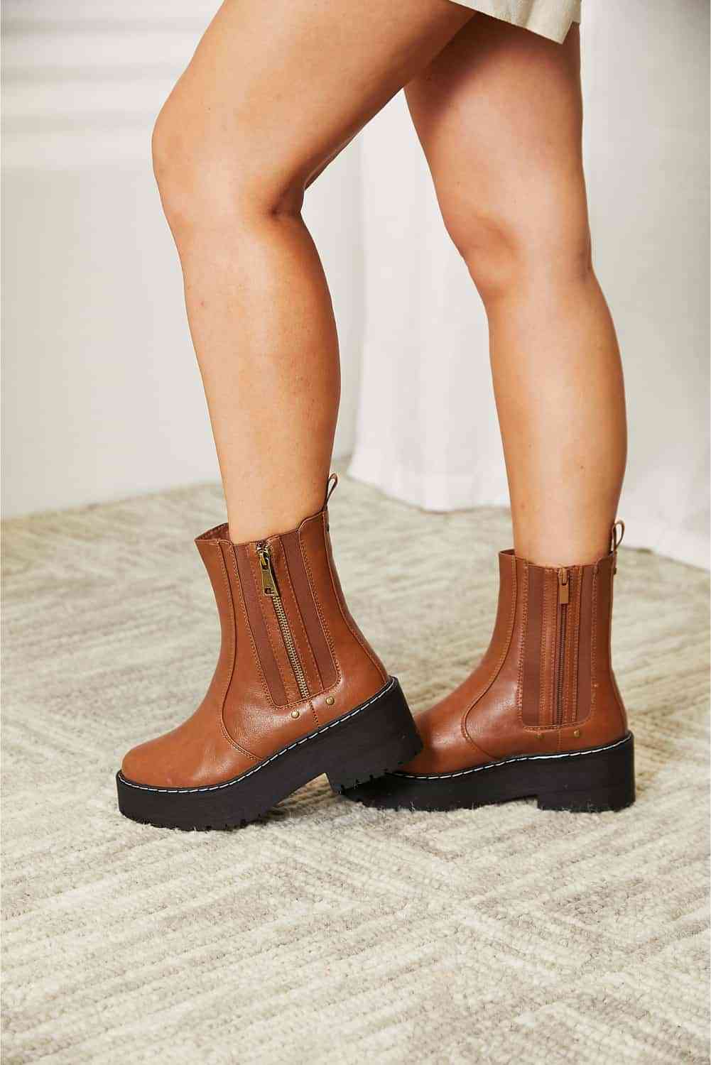 Side zip platform boots: stylish, practical, convenient, and durable for any outfit and terrain.